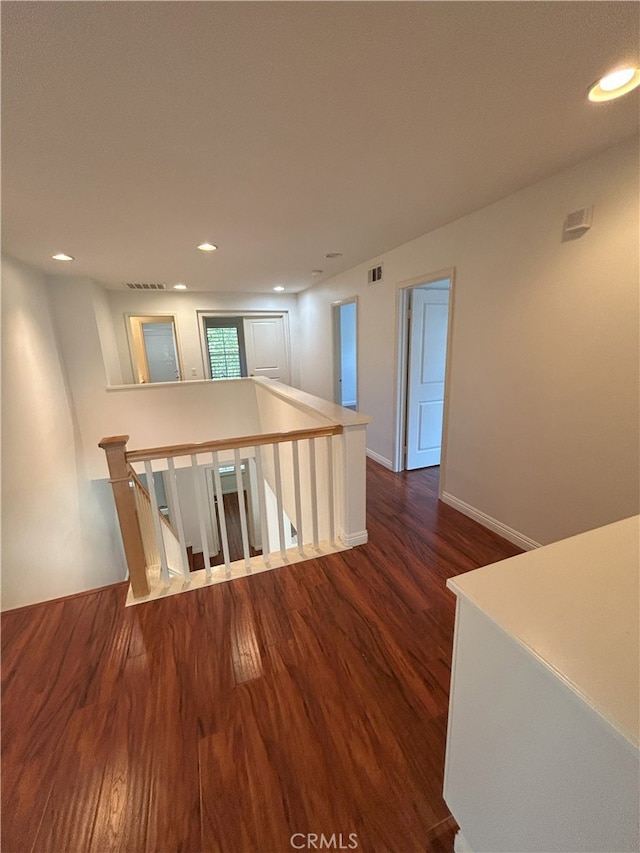 39877 Worthington Pl, Temecula, CA 92591 - hall featuring an upstairs landing, wood finished floors, and recessed lighting