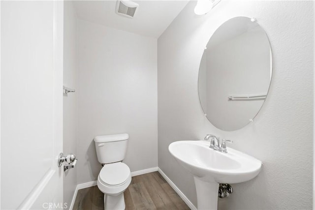 37398 Paseo Violeta Unit 75, Murrieta, CA 92563 - half bathroom with wood finished floors and toilet