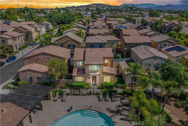 37398 Paseo Violeta Unit 75, Murrieta, CA 92563 - aerial view of residential area with a pool area and a mountainous background