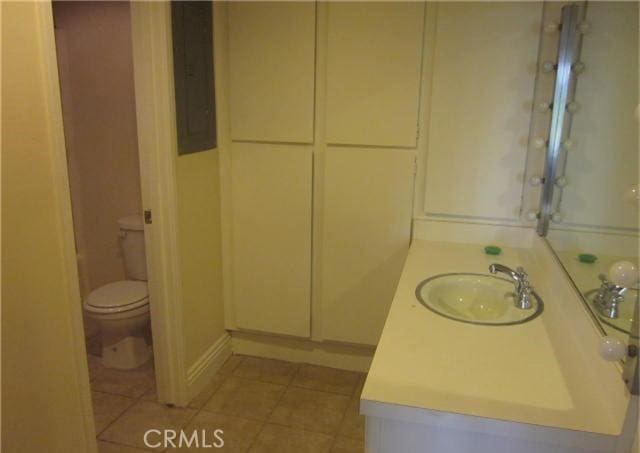 23551 Avenida La Caza Unit 129, Coto De Caza, CA 92679 - bathroom featuring vanity and tile patterned flooring