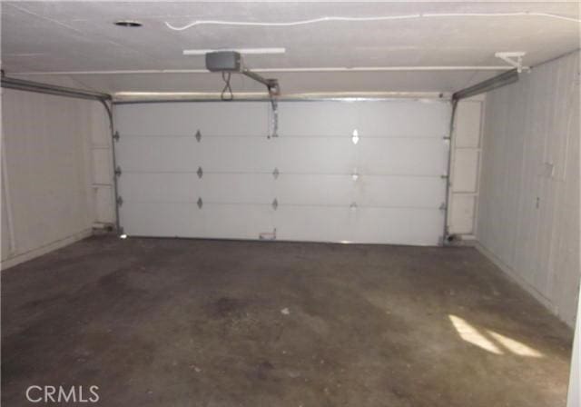 23551 Avenida La Caza Unit 129, Coto De Caza, CA 92679 - garage with a garage door opener
