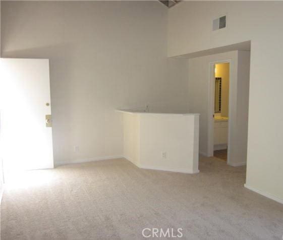 23551 Avenida La Caza Unit 129, Coto De Caza, CA 92679 - empty room featuring light colored carpet