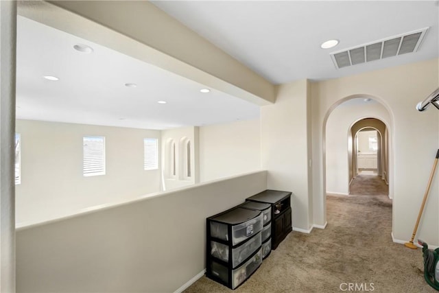 15247 Bandera Way, Victorville, CA 92394 - hallway with carpet floors, arched walkways, and recessed lighting