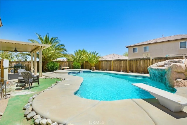 15247 Bandera Way, Victorville, CA 92394 - view of swimming pool with a fenced backyard, a patio area, ceiling fan, a diving board, and a pool with connected hot tub