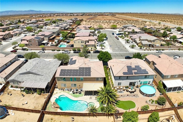 15247 Bandera Way, Victorville, CA 92394 - aerial perspective of suburban area with a pool area and a mountain backdrop