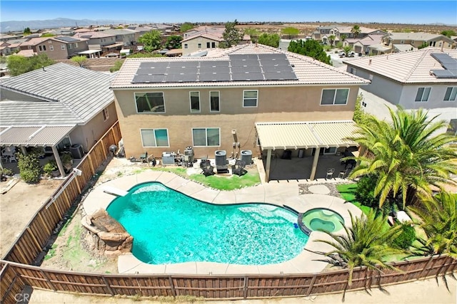 15247 Bandera Way, Victorville, CA 92394 - view of swimming pool with a fenced backyard, a residential view, a pool with connected hot tub, and a patio area