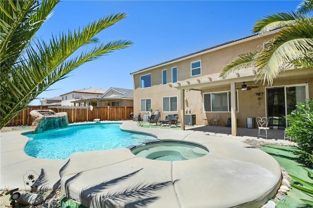 15247 Bandera Way, Victorville, CA 92394 - view of pool featuring a fenced backyard, a ceiling fan, a patio area, and a pool with connected hot tub