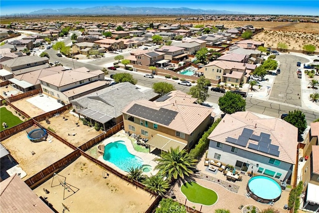 15247 Bandera Way, Victorville, CA 92394 - aerial perspective of suburban area featuring a pool and a mountain backdrop