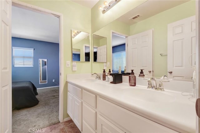 15247 Bandera Way, Victorville, CA 92394 - full bath featuring double vanity and baseboards
