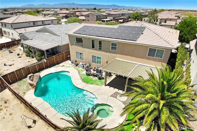 15247 Bandera Way, Victorville, CA 92394 - view of swimming pool featuring a fenced backyard, a residential view, a patio area, and a pool with connected hot tub
