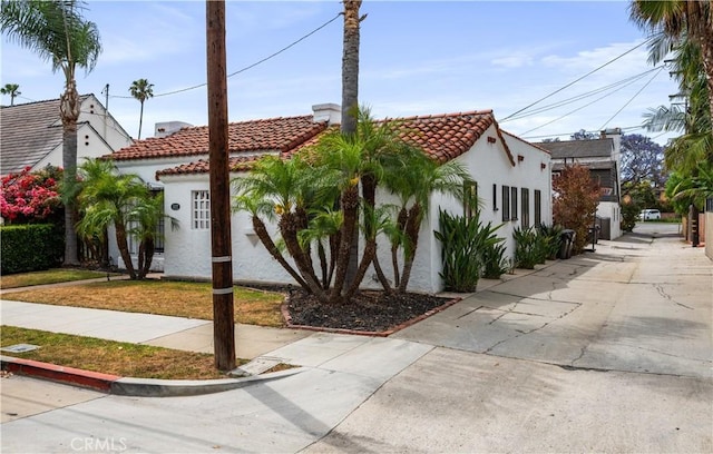 5022 E Broadway, Long Beach, CA 90803 - mediterranean / spanish-style house with a tile roof and stucco siding