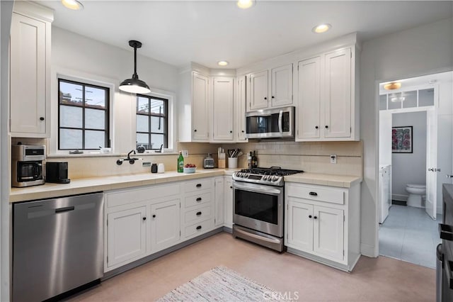 5022 E Broadway, Long Beach, CA 90803 - kitchen featuring stainless steel appliances, tile counters, white cabinets, and recessed lighting