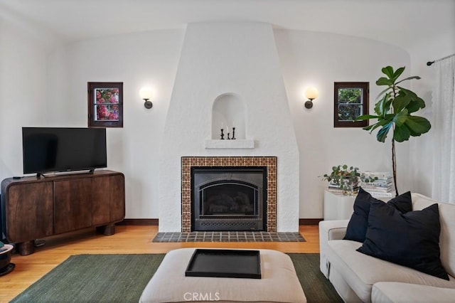 5022 E Broadway, Long Beach, CA 90803 - living room with wood finished floors, a fireplace, and vaulted ceiling