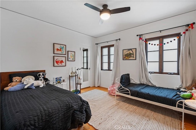 5022 E Broadway, Long Beach, CA 90803 - bedroom featuring light wood-style floors and a ceiling fan