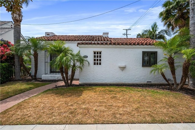 5022 E Broadway, Long Beach, CA 90803 - view of front of property with stucco siding, a tile roof, and a front yard