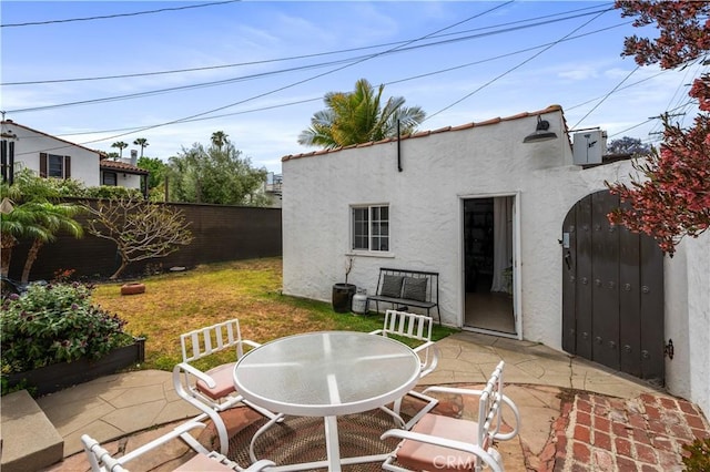 5022 E Broadway, Long Beach, CA 90803 - fenced backyard with a patio area and outdoor dining space