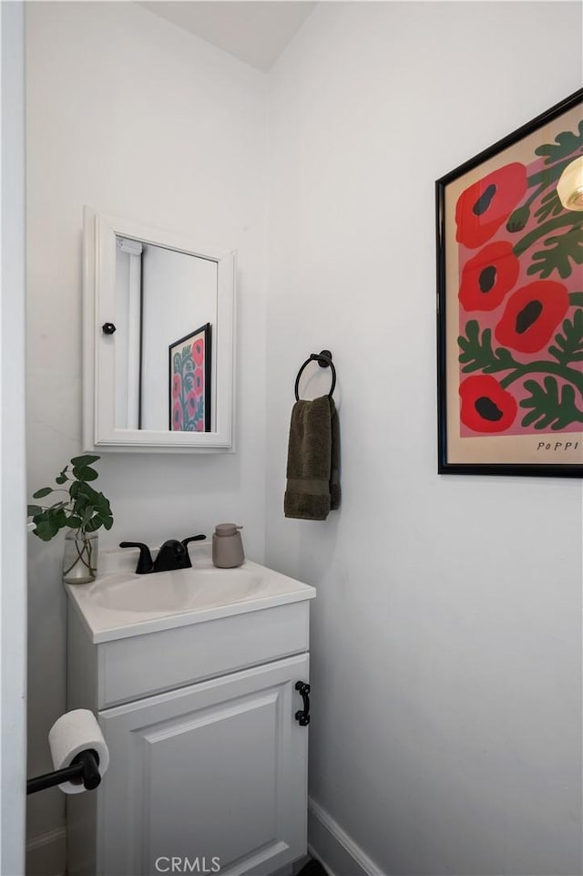 5022 E Broadway, Long Beach, CA 90803 - bathroom with vanity and baseboards
