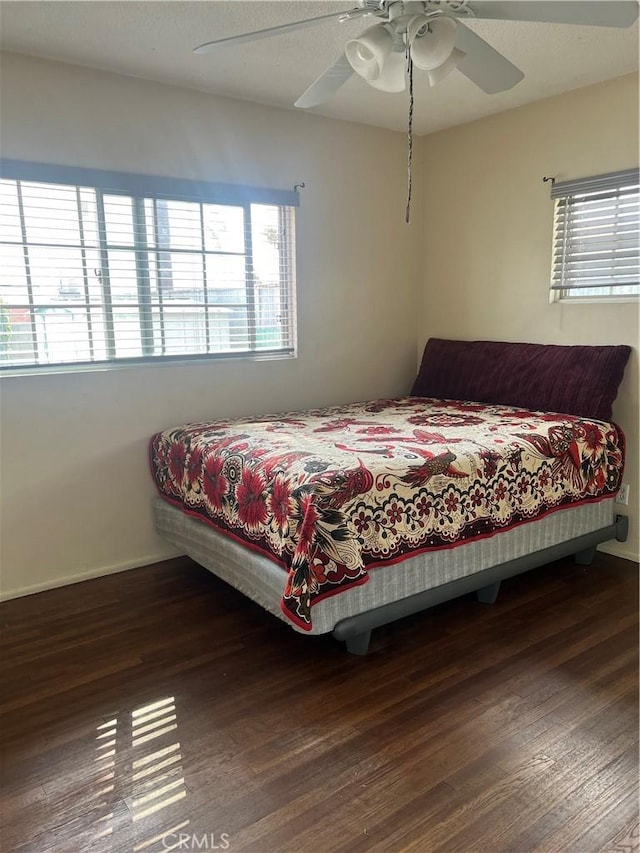 25521 17th St, San Bernardino, CA 92404 - bedroom featuring multiple windows, wood finished floors, and ceiling fan