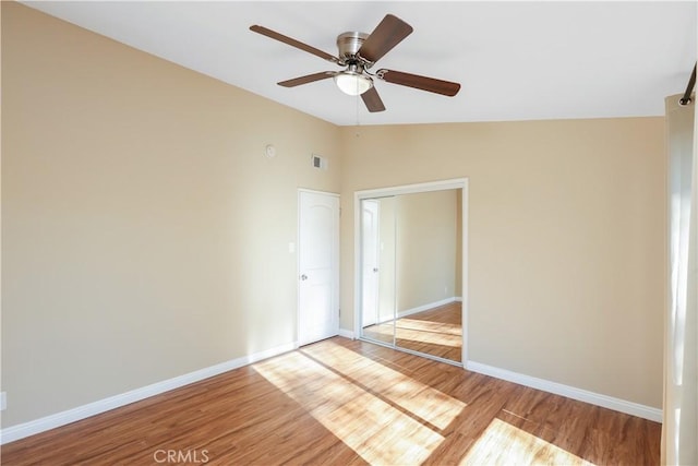 1305 W Beverly Dr, Orange, CA 92868 - unfurnished room with light wood finished floors, lofted ceiling, and ceiling fan