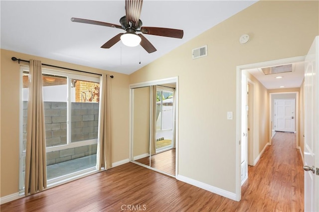 1305 W Beverly Dr, Orange, CA 92868 - spare room with lofted ceiling, light wood-style floors, a ceiling fan, and a smoke detector