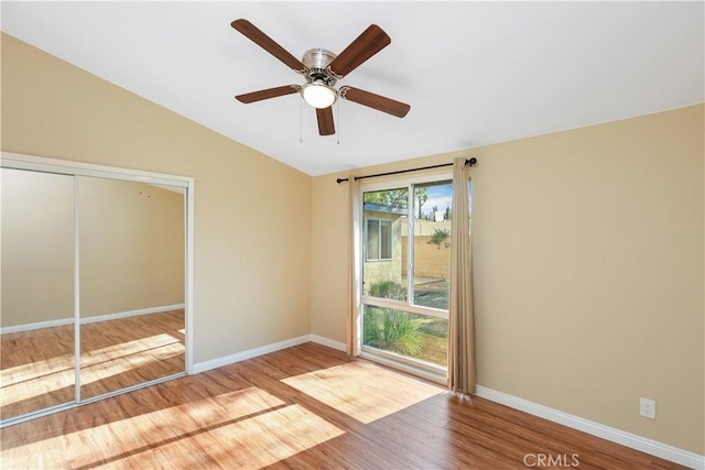 1305 W Beverly Dr, Orange, CA 92868 - unfurnished room with wood finished floors, lofted ceiling, and a ceiling fan