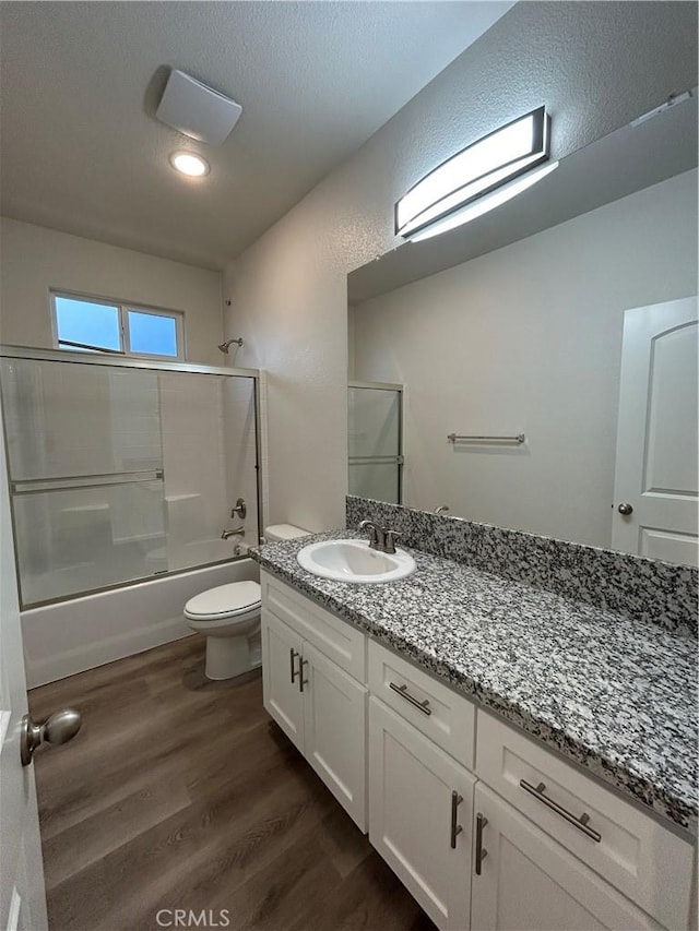 60 Sedona Dr, Merced, CA 95341 - bathroom featuring vanity, wood finished floors,  shower combination, and recessed lighting