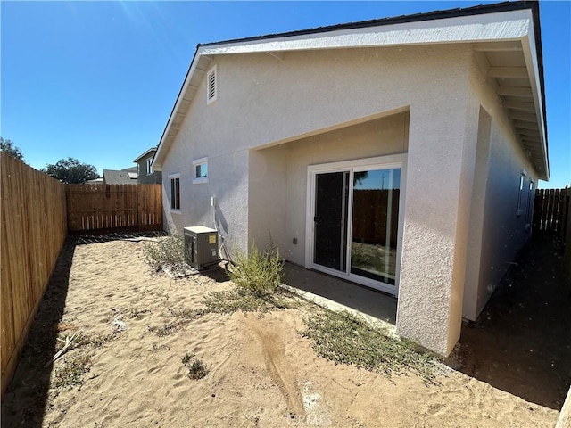 60 Sedona Dr, Merced, CA 95341 - back of house with stucco siding and a fenced backyard