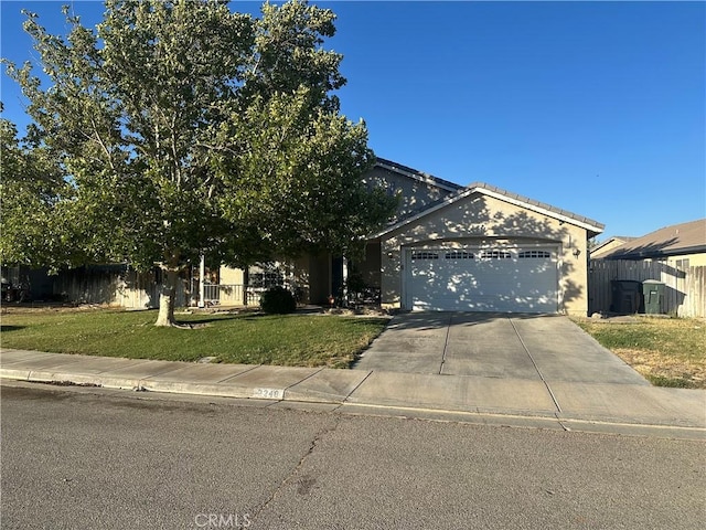 2248 Greenhill St, Rosamond, CA 93560 - obstructed view of property with an attached garage, driveway, and stucco siding