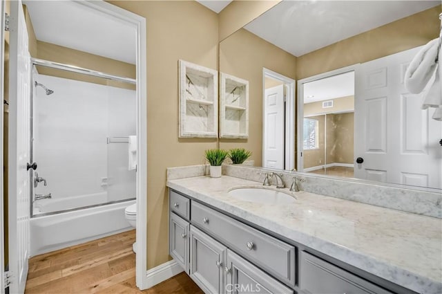 24676 Vista Cerritos, Calabasas, CA 91302 - full bathroom featuring vanity, wood finished floors, and  shower combination