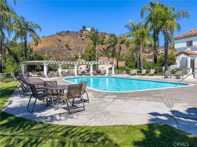 24676 Vista Cerritos, Calabasas, CA 91302 - community pool featuring a pergola, a patio, and a mountain view