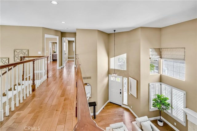 24676 Vista Cerritos, Calabasas, CA 91302 - entrance foyer with light wood finished floors, healthy amount of natural light, and recessed lighting