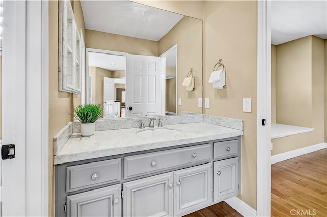 24676 Vista Cerritos, Calabasas, CA 91302 - bathroom featuring vanity and wood finished floors
