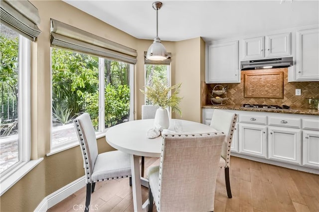 24676 Vista Cerritos, Calabasas, CA 91302 - dining space with light wood-type flooring