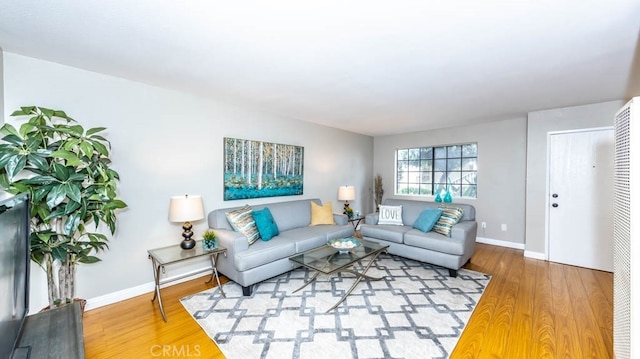 8800 Garden Grove Blvd Unit 2, Garden Grove, CA 92844 - living area with wood finished floors and a heating unit