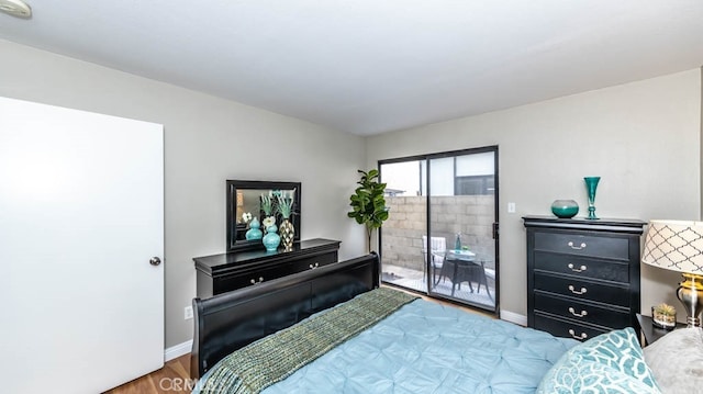 8800 Garden Grove Blvd Unit 2, Garden Grove, CA 92844 - bedroom featuring access to outside and wood finished floors