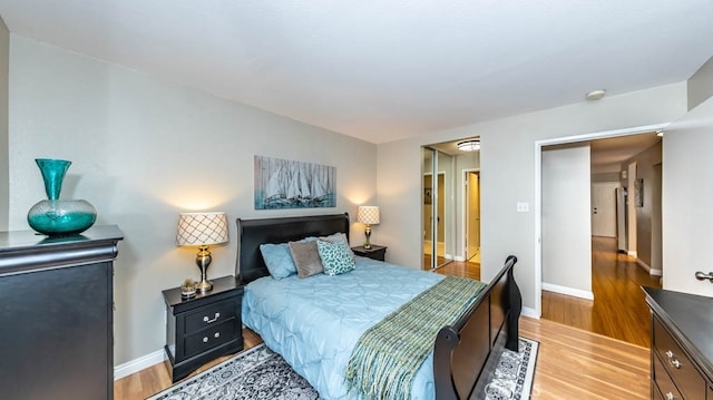 8800 Garden Grove Blvd Unit 2, Garden Grove, CA 92844 - bedroom featuring light wood finished floors and baseboards