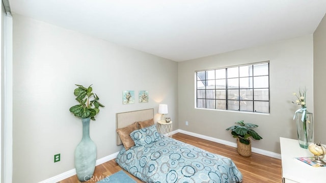 8800 Garden Grove Blvd Unit 2, Garden Grove, CA 92844 - bedroom featuring wood finished floors