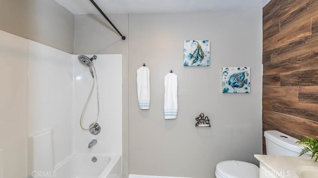 8800 Garden Grove Blvd Unit 2, Garden Grove, CA 92844 - bathroom with wood walls, washtub / shower combination, and vanity