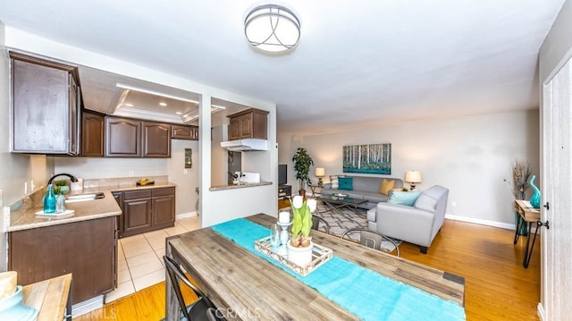 8800 Garden Grove Blvd Unit 2, Garden Grove, CA 92844 - dining space with baseboards and light tile patterned floors