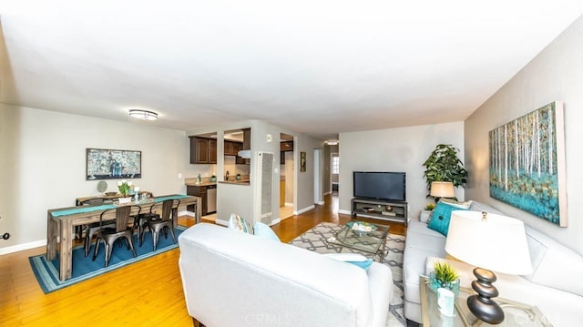8800 Garden Grove Blvd Unit 2, Garden Grove, CA 92844 - living room featuring light wood finished floors