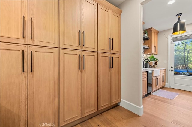 22388 Riverstream Ct, Saugus, CA 91350 - detailed view of wood finished floors, stainless steel dishwasher, and recessed lighting