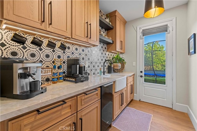 22388 Riverstream Ct, Saugus, CA 91350 - kitchen with dishwasher, backsplash, light wood-style floors, open shelves, and light stone counters