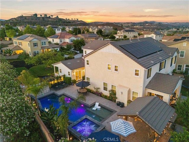22388 Riverstream Ct, Saugus, CA 91350 - aerial view at dusk of view of pool and a residential view