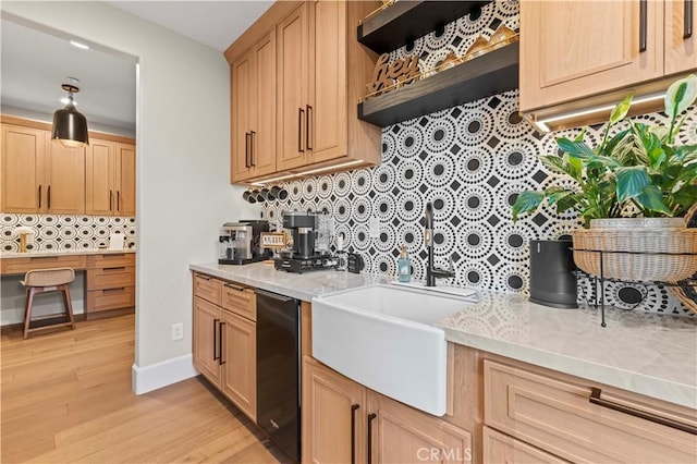 22388 Riverstream Ct, Saugus, CA 91350 - kitchen with backsplash, light wood-type flooring, light stone countertops, and light brown cabinetry