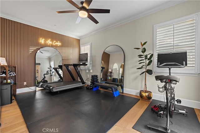22388 Riverstream Ct, Saugus, CA 91350 - exercise room featuring arched walkways, ornamental molding, and a ceiling fan