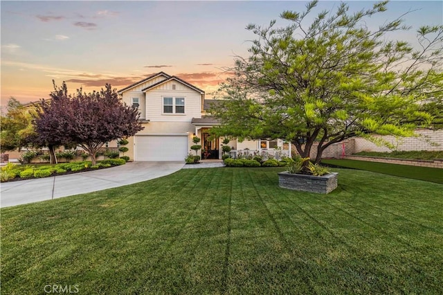 22388 Riverstream Ct, Saugus, CA 91350 - traditional home featuring an attached garage, driveway, and a front lawn