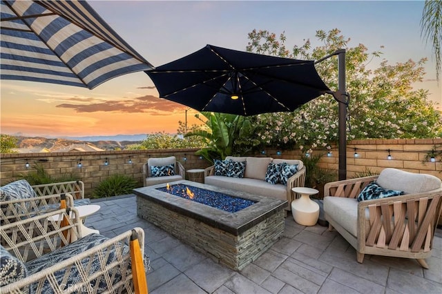 22388 Riverstream Ct, Saugus, CA 91350 - view of patio with an outdoor living space with a fire pit