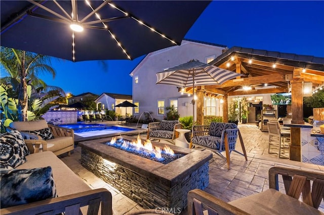 22388 Riverstream Ct, Saugus, CA 91350 - view of patio / terrace with an outdoor fire pit and an outdoor pool