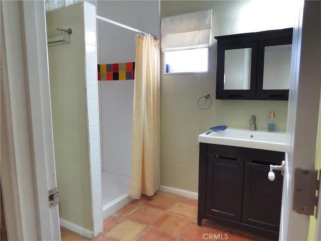 22727 Mariano St, Woodland Hills, CA 91367 - bathroom with vanity and a tile shower