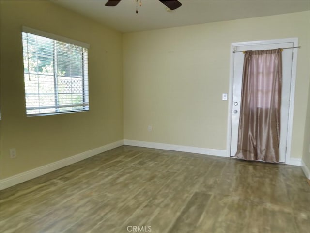22727 Mariano St, Woodland Hills, CA 91367 - unfurnished room with a ceiling fan and wood finished floors